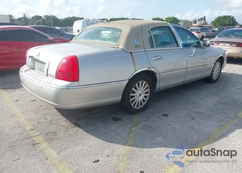 2005 Lincoln Town Car Signature z USA, uszkodzony, nr VIN 1LNHM81W75Y637691